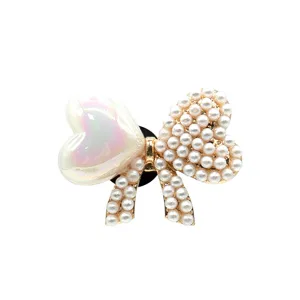 Pearl bow shoe charm for clogs, elegant metal alloy footwear decoration accessories for women.