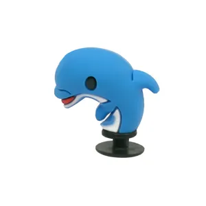 Cute 3D blue dolphin shoe charm detail, PVC material garden shoe decoration accessory close-up.