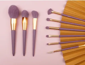 9-piece purple makeup brush set with synthetic hair, powder, foundation, and eyeshadow brushes.