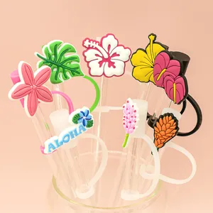 Detailed shot of tropical Hawaiian style silicone straw toppers, cute floral dust covers for cups.
