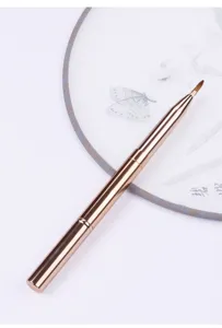 Double-ended retractable lip brush with cap, rose gold metallic portable makeup tool.