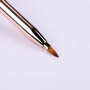 Portable double-ended retractable lip brush with rose gold metal cap and soft brown bristles.