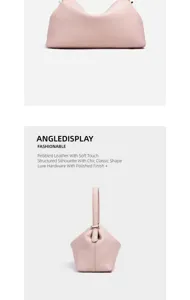 Detalle de bolso de cuero graneado rosa, tacto suave y silueta estructurada chic.