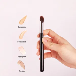 Large thumb makeup brush for flawless concealer blending and liquid foundation application.