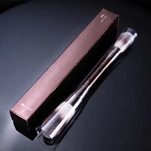 Double-ended makeup brush with packaging box, fluffy powder brush and highlighter tool.
