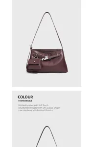 Detailed view of the luxury pebble leather shoulder bag with chic turn-lock hardware.