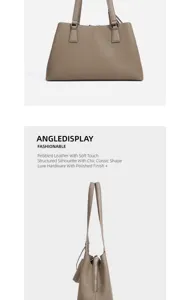 Detailansicht der Damen Handtasche aus geprägtem Leder mit eleganter Struktur und feinem Metall.