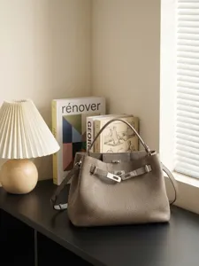 Bolso de cubo vintage de cuero auténtico, bolso de hombro cruzado elegante y versátil