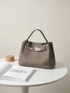 Bolso de cubo retro informal de piel de vaca de alta calidad elegante bolso de hombro mujer