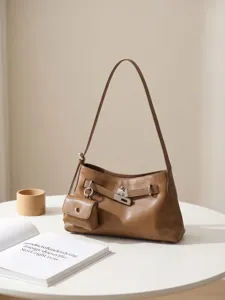 Retro brown genuine leather shoulder bag, chic top-handle tote with metal lock and pouch.