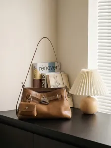 Brown leather shoulder bag with small pouch, stylish retro tote handbag for women daily wear.