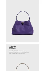 Borsa a mano in vera pelle martellata viola con manico superiore e forma classica ed elegante.