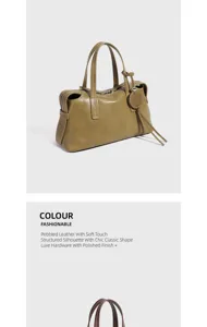 Borsa a mano in vera pelle, design strutturato chic con manici superiori e finiture.