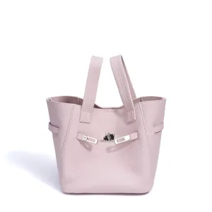 Pink leather handbag for women, stylish top handle tote bag with metal lock closure and chic design.
