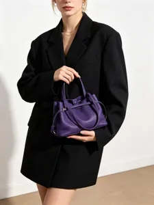 Genuine leather purple shoulder bag for women, stylish commuting casual drawstring bucket tote.