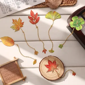 Vintage metal leaf bookmarks set with chain, aesthetic page markers for reading and gifts.