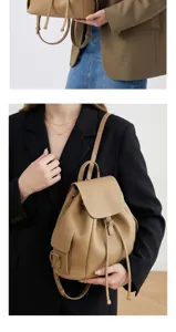 Detail shot of a stylish khaki genuine leather backpack for women, elegant and versatile.