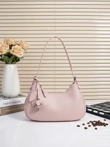 Rosa Leder Umhängetasche für Damen, elegante Hobo Mond Tasche mit stilvollen Quasten.