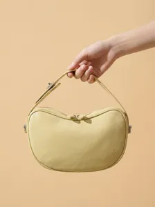 Bolso de hombro de cuero amarillo para mujer, elegante bolso con diseño de frijol muy moderno.