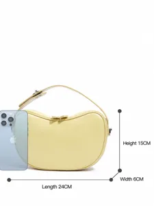 Bolso de piel de cordero amarillo en forma de judia bandolera elegante vista principal