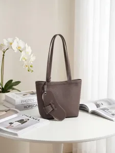 Elegant leather tote shoulder bag for women, spacious daily commuter handbag with stylish design.