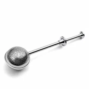 Stainless steel telescopic tea infuser detail, fine mesh strainer for loose leaf tea brewing.