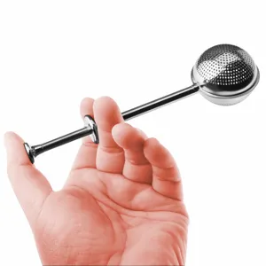 Stainless steel push tea infuser detail view, convenient telescopic strainer for loose tea.
