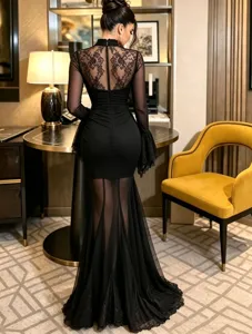 Detalles del vestido de noche negro de manga larga, encaje y malla ajustada, elegante.