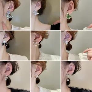 Exquisite zircon butterfly earrings featuring elegant tassel designs for women and girls.
