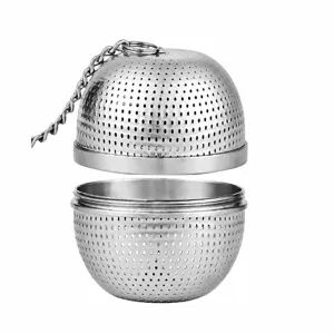 Stainless steel tea infuser ball detail, threaded screw lid and fine mesh design.