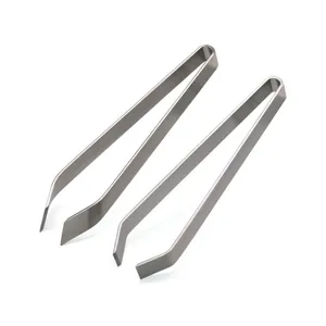 Close-up view of stainless steel fish bone tweezers, durable kitchen tool for plucking hair.