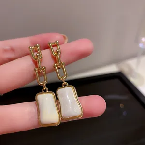 Gold chain irregular white stone drop earrings, elegant fashion women jewelry detail view