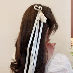 Pinza de pelo con lazo de tela estilo francés, elegante accesorio para mujeres.