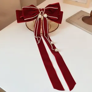 Pinza para el pelo con lazo de terciopelo francés perlas diamantes cinta larga.