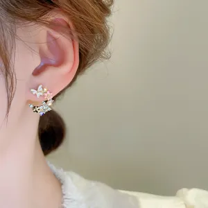 Elegant sterling silver needle zircon butterfly flower earrings, chic and fairy-like jewelry.