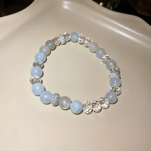 Exquisite detail view of light blue crystal beaded bracelet with sparkling crystal accents.