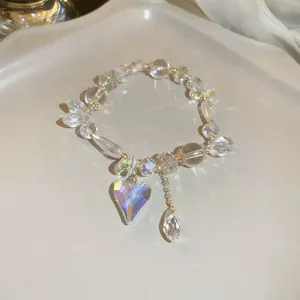 Stunning crystal bead bracelet featuring a sparkling heart pendant for elegant daily wear.