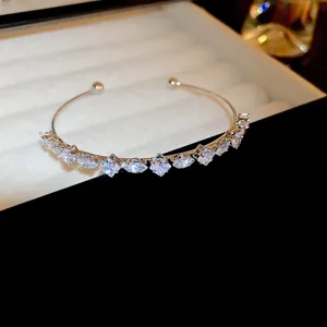 Crystal pull-adjustable delicate bracelet detail, luxury sparkly rhinestone wrist chain show.