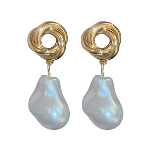 Elegant gold twisted knot baroque pearl drop earrings for women, chic fashion statement jewelry.