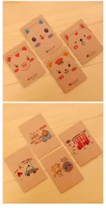 Detailed view of mini cartoon kraft paper notebooks featuring cute animal and car designs.
