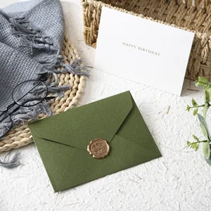 Green tactile paper envelope with vintage wax seal sticker, aesthetic greeting card for birthday gifts.