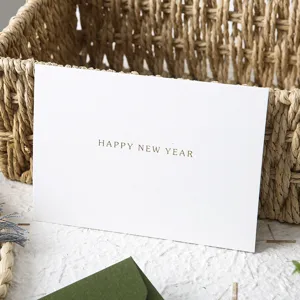 Western touch paper green envelope with white greeting card, retro style for new year events.