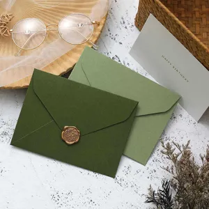 Avocado green retro tactile paper envelopes with wax seal for greeting cards invitations.