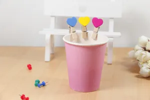 Colorful heart wooden clips detail shot, cute memo photo hanging clips for home and classroom decor.