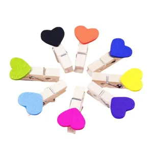 Colorful wooden heart clips set for photo hanging, memo notes and room decor supplies.