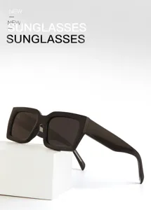 Detailed view of the black square sunglasses showing bold frames and sleek design.