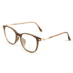 Stylish anti-blue light reading glasses with chic brown frame and gold temples for clear vision.