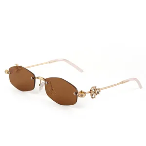 Chic polygonal rimless sunglasses for women with gradient brown lenses and crystal temples.