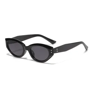 Fashion retro black oval sunglasses with metal rivet details for women and men sun protection