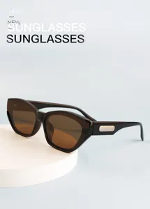 Detailed view of trendy retro cat-eye sunglasses with polarized lenses and UV protection.